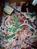 Several drawers of vintage costume jewelry. Watch for more details and pictures after we sort it out.
