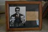 Framed photo and signatures of Buddy Holly and Crickets.