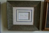 Framed autograph by Mark Twain.