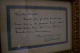 Framed note written and signed by Otto Frank (father of Anne Frank).