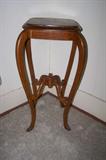 Antique plant stand.