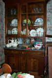Marble-top buffet with china hutch--beautiful antique furniture filled with antique and vintage glassware and china.