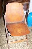 4 antique wooden folding chairs.