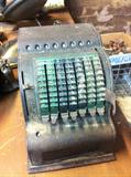 Antique adding machine.