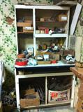 Hoosier-style kitchen cabinet--it's all there, just put it together. Oh, and it's full upholstery stuff.
