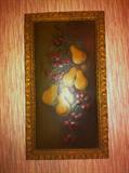 Vintage embossed print of fruit in decorative frame.