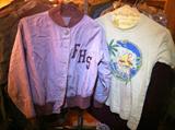 Vintage clothing from 1950s and 1960s. Shown here, small size FHS jacket and Florida souvenir t-shirt.