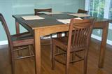 Bistro-style table with 4 chairs.