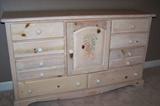 Queen-size bedroom group includes this large dresser (no mirror).