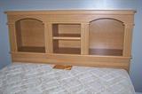 Queen-size bedroom group includes this bookcase headboard.