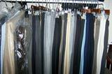 Closets full of men's clothing and accessories--suits, sportscoats, pants, shirts, ties, scarves, sweaters, shoes and boots. These clothing items are new and like-new, clean and well cared for. Suit sizes are 40 short, shirts are medium sizes. There are many name-brand and designer labels including Armani.