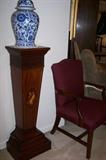 Assorted pedestals and plant stands, table decor, furniture galore.