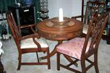 Small round table with chairs, table-top decor.