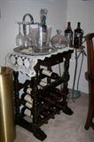 Wine rack and assorted barware.