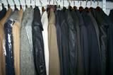 Closets full of men's clothing and accessories--suits, sportscoats, pants, shirts, ties, scarves, sweaters, shoes and boots. These clothing items are new and like-new, clean and well cared for. Suit sizes are 40 short, shirts are medium sizes. There are many name-brand and designer labels including Armani.