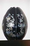 Beautiful large black lacquer egg with inlaid mother of pearl--beautiful. (One of a pair, other one is damaged around base.)