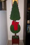 Decorative topiary tree with mini lights.