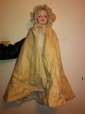 Antique compostion doll with period clothing.
