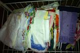 Dozens and dozens of vintage hankies and scarves.