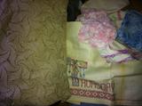 Lots and lots of vintage linens--handwork of all kinds.