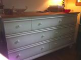 Contemporary large dresser--white with natural wood top.