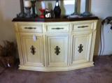 Console cabinet or crendenza. Three doors open up to shelving; two outside drawers pull out.
