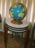 Vintage globe and vintage stackable tables.