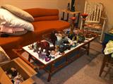 Assorted vintage and collectible furniture.