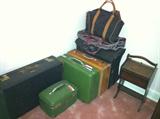 Assorted vintage luggage, American Tourister and others; vintage sewing box.