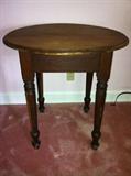 Small round antique table.