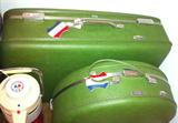 Vintage American Tourister luggage--two suitcases, overnight case and round case, all in nice condition.