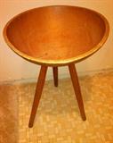 Vintage dough bowl on legs.
