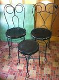 4 antique ice cream parlor chairs; 1 stool.