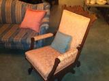 Vintage sofa and antique gliding rocker.