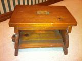 Two wooden foot stool and other small furniture.