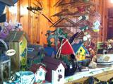 Assorted birdhouses, decorative and usable.