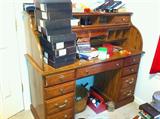 Roll top desk loaded with good items.