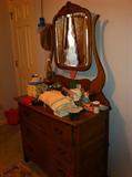 Antique oak dresser with wishbone mirror.