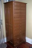 Unique antique storage cabinet. Has 12 drawers, nice metal pulls.