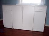 3-section modular cabinet with top extending over all three sections.