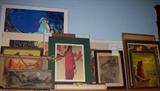Assorted art prints, shrink-wrapped for protection. 