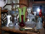 Assorted antique and vintage perfume bottles, vases.