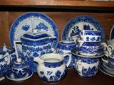 Large assorted blue/white transferware, brown transferware, and blue willow.