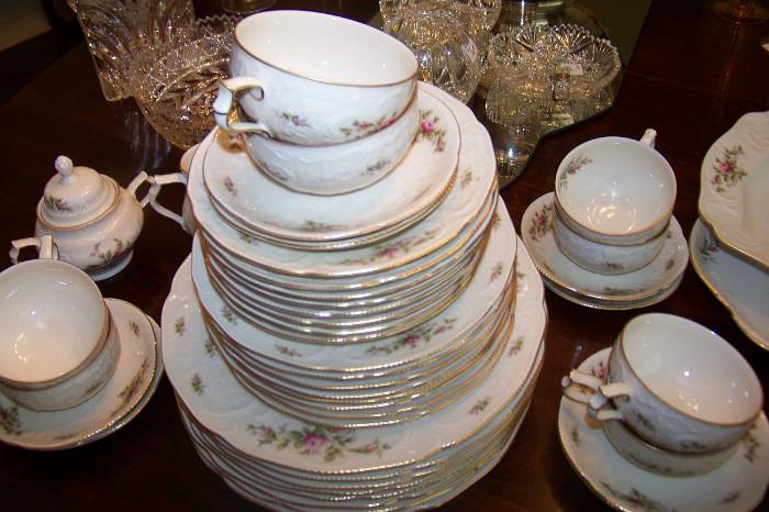 Large set of Rosenthal china - there is a service for 16 - I have divided the set into two sets of 8 - Each set has 8 dinner plates, 8 salad plates, 8 bread and butter, 8 cups and saucers, one platter, and cream and sugar.  Also, one of the sets also includes a vegetable bowl