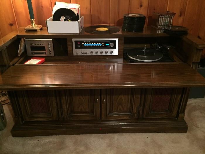 Vintage Magnavox Console Stereo with Turntable and 8 Track Player  and lots of storage below.  Really Cool.  It works!!!!