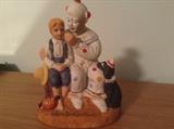 Norman Rockwell clown and child figurine with dog