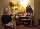 Michigan fans take note! Longtime fan collection of souvenirs, clothing, party supplies, dog bed, and much more