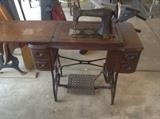 Standard treadle sewing machine in beautiful original cabinet
