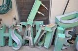These great metal letters are about 18" tall, once had neon inside.