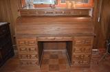 Gorgeous solid Oak provincial roll top desk. Carved Mexican Stone Book Ends on top.
